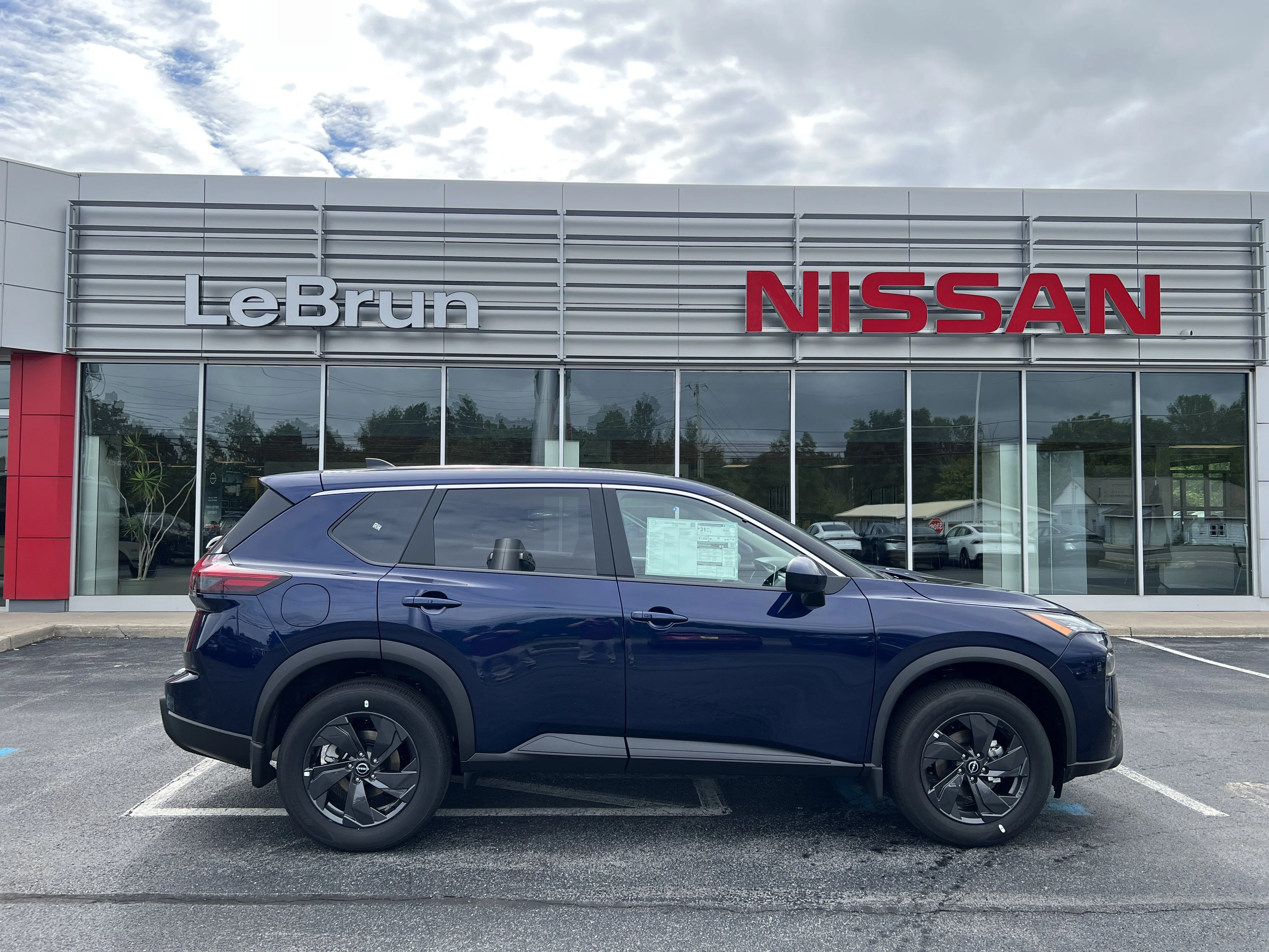 New 2026 Deep Ocean Blue Pearl Nissan SV image 1