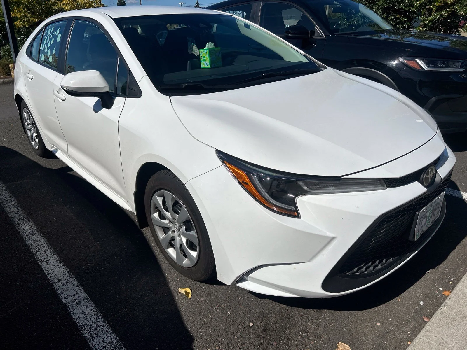 Used 2021 Super White Toyota LE image 4