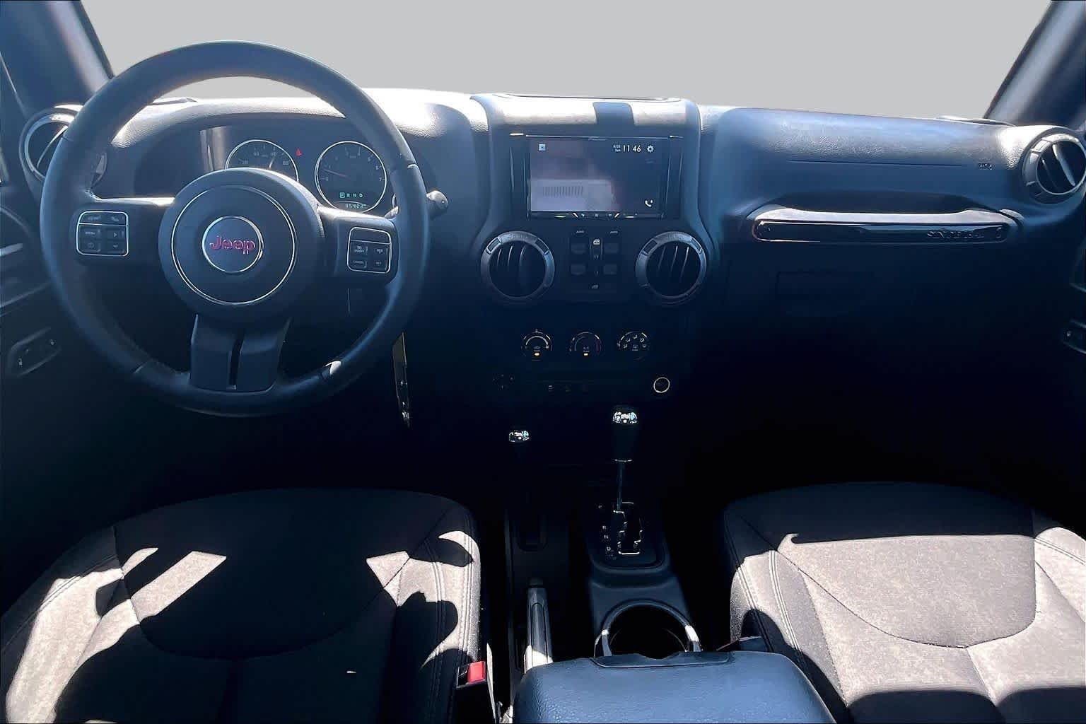 Used 2018 Granite Crystal Metallic Clearcoat Jeep Sport S image 13