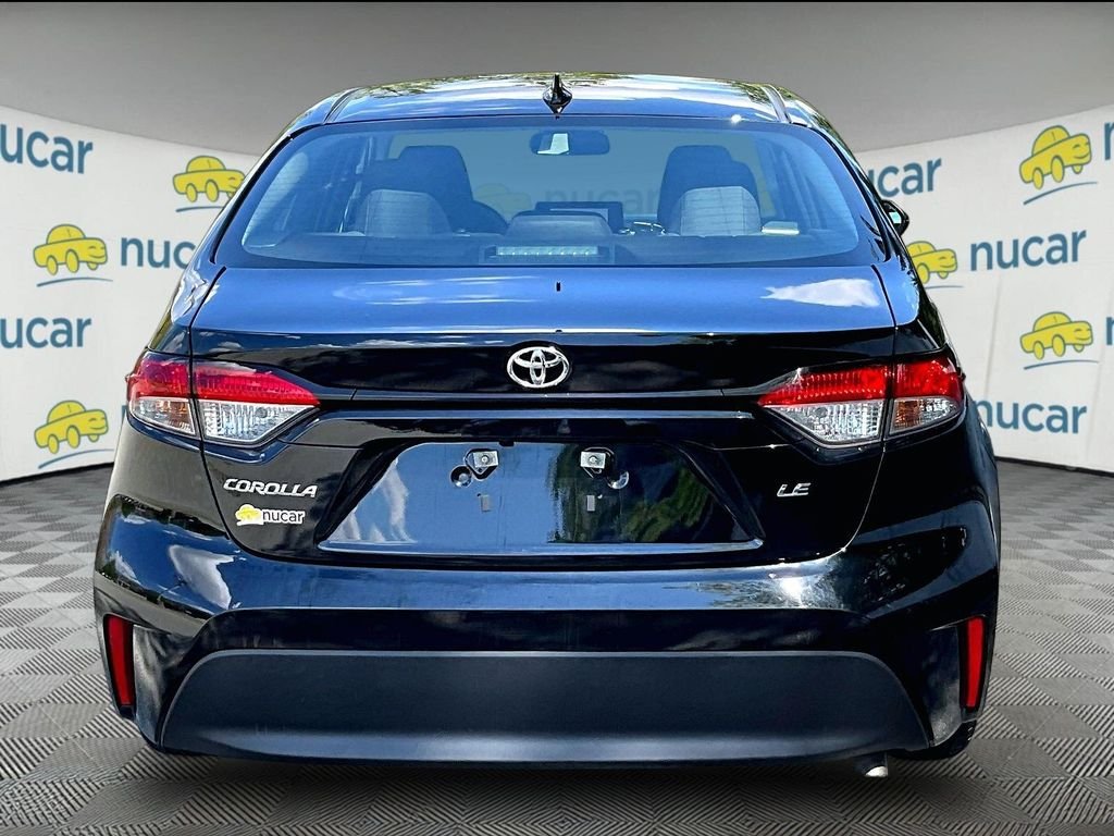 Used 2024 Black Toyota LE image 5
