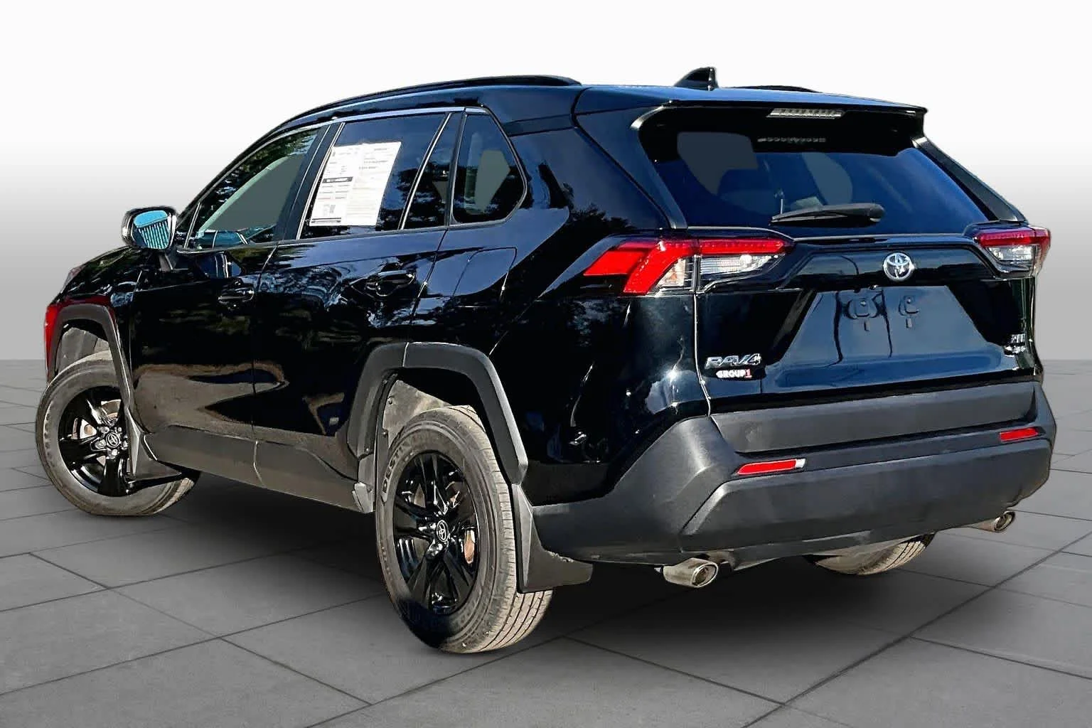 Used 2024 Midnight Black Metallic Toyota XLE image 12