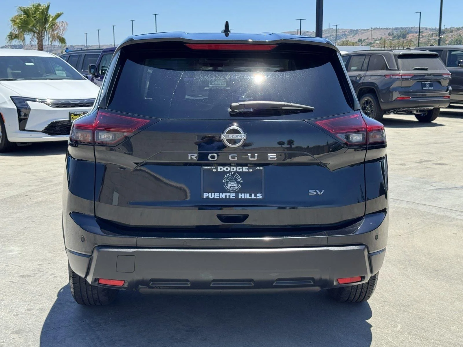 Used 2024 Super Black Nissan SV image 5