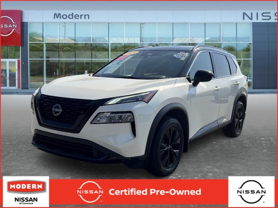 Used 2023 Pearl White Tricoat/Super Black Nissan SV image 1