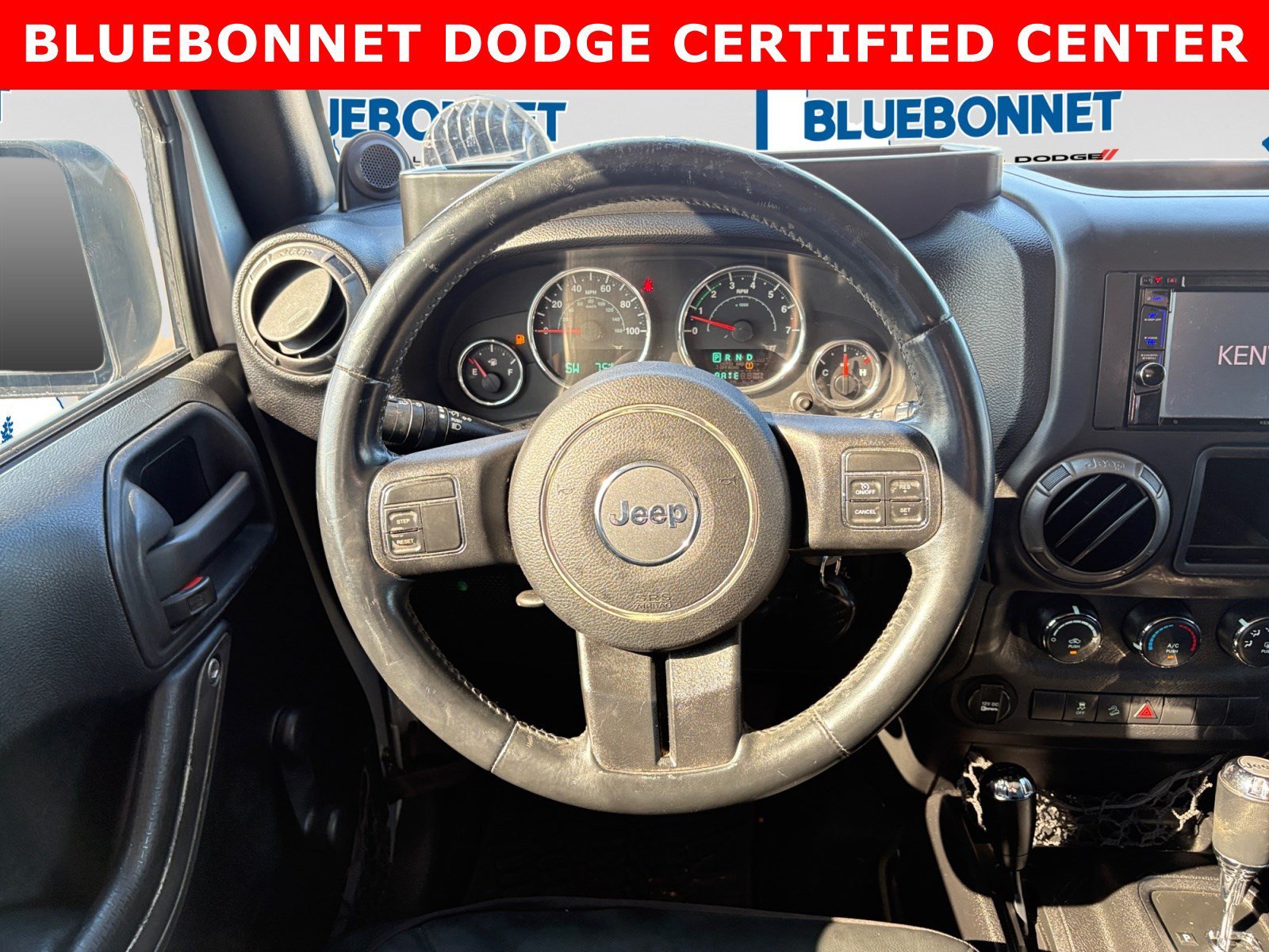 Used 2012 Bright Silver Metallic Jeep Sport image 13