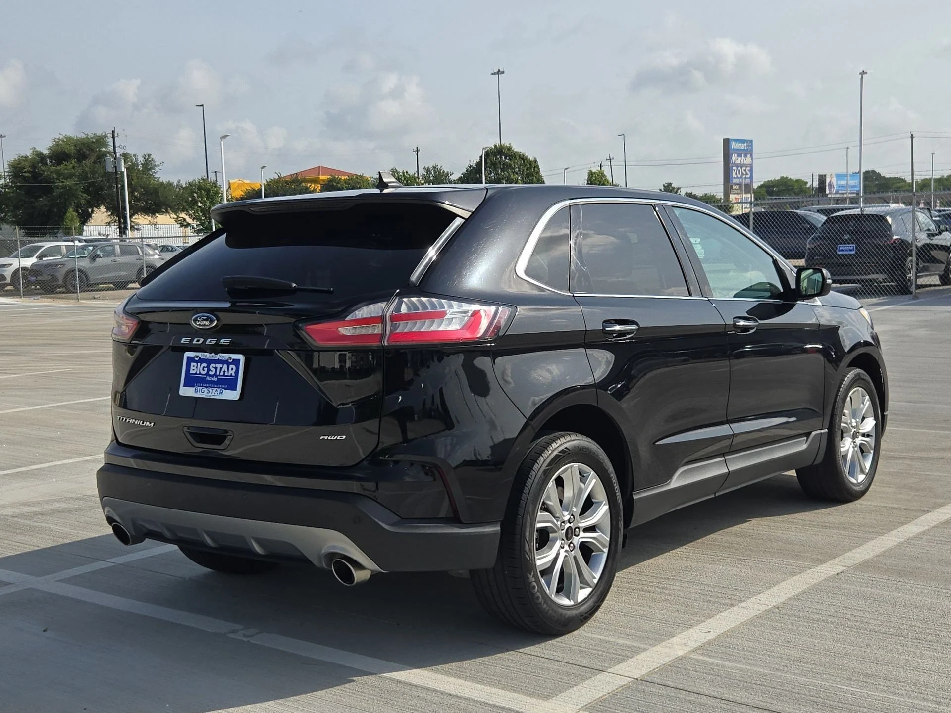 Used 2024 Black Metallic Ford Titanium image 3