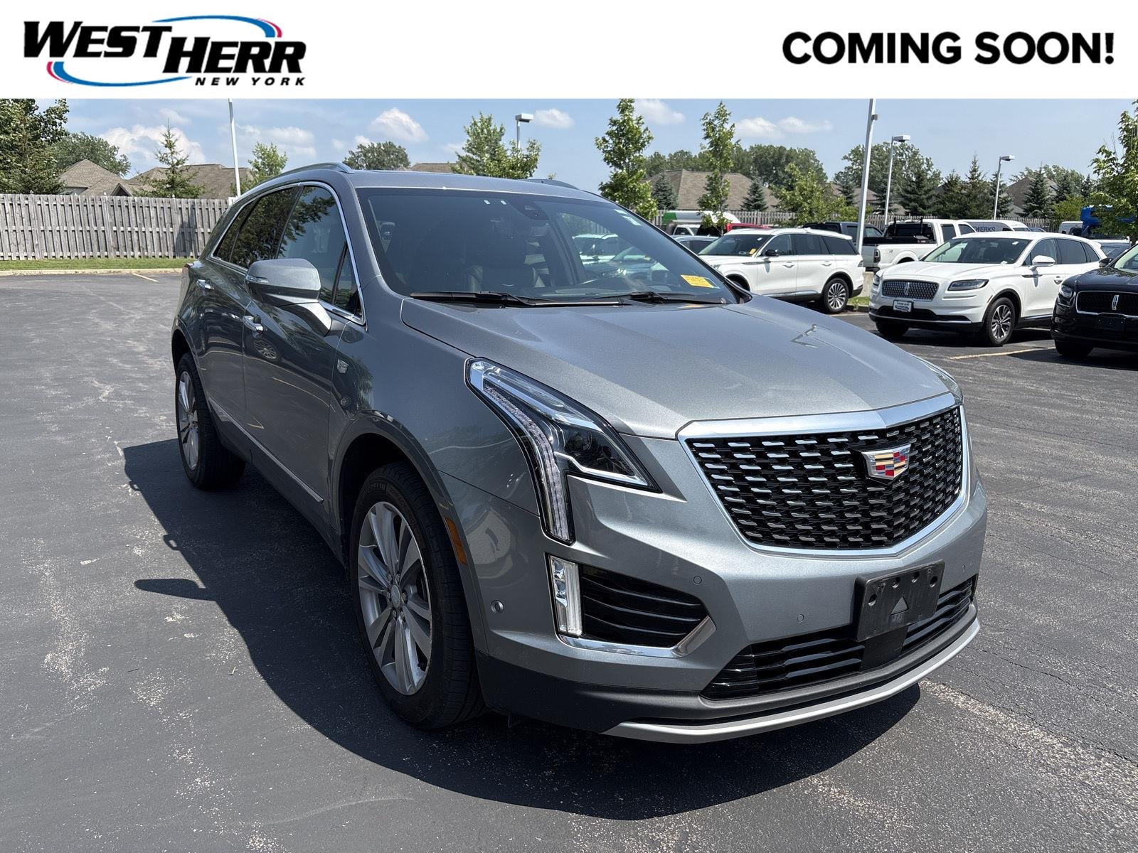 Used 2024 Argent Silver Metallic Cadillac AWD Premium Luxury image 1