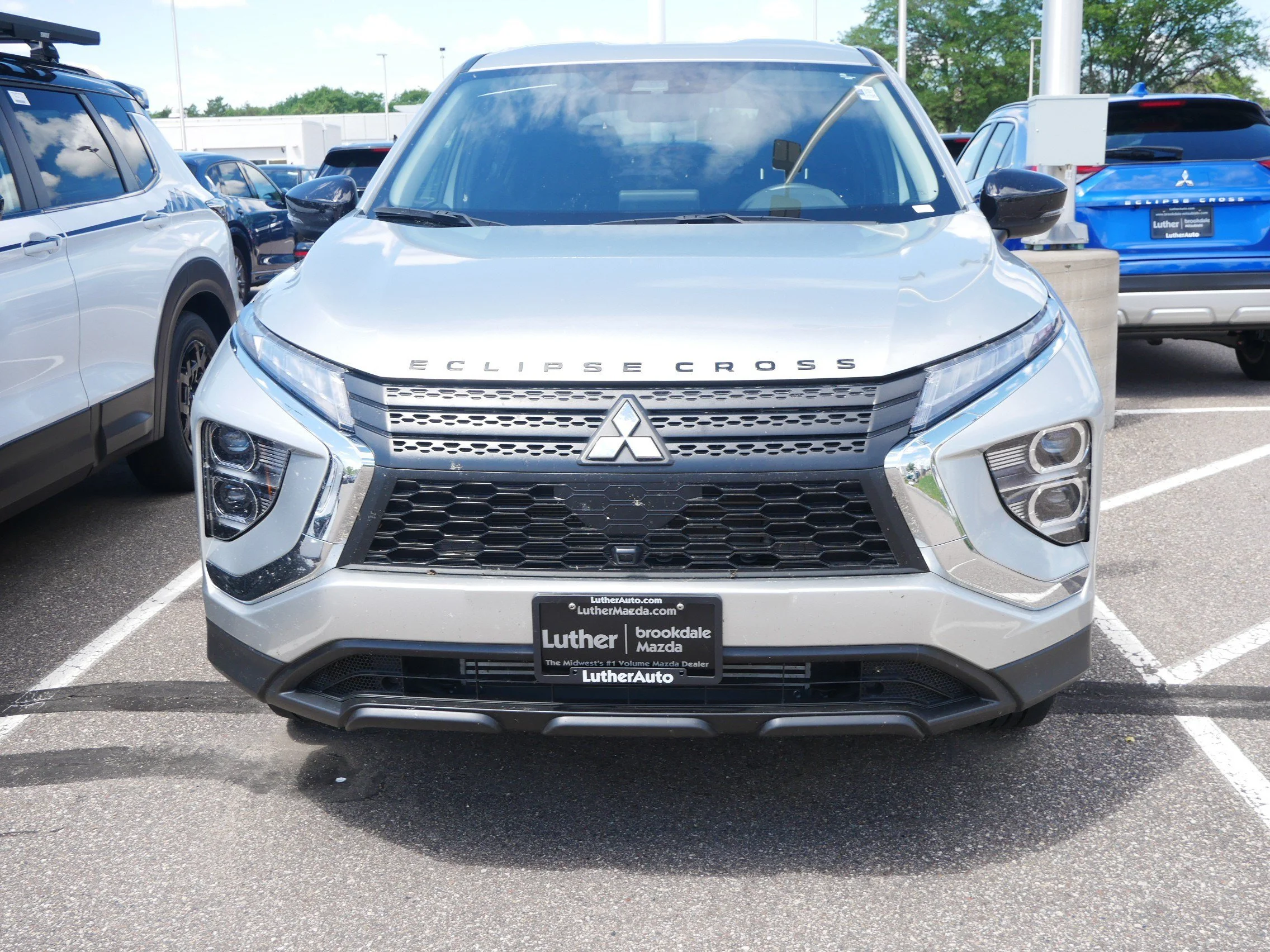 Used 2024 Mitsubishi Eclipse Cross LE with VIN JA4ATVAA1RZ027484 for sale in Brooklyn Center, Minnesota