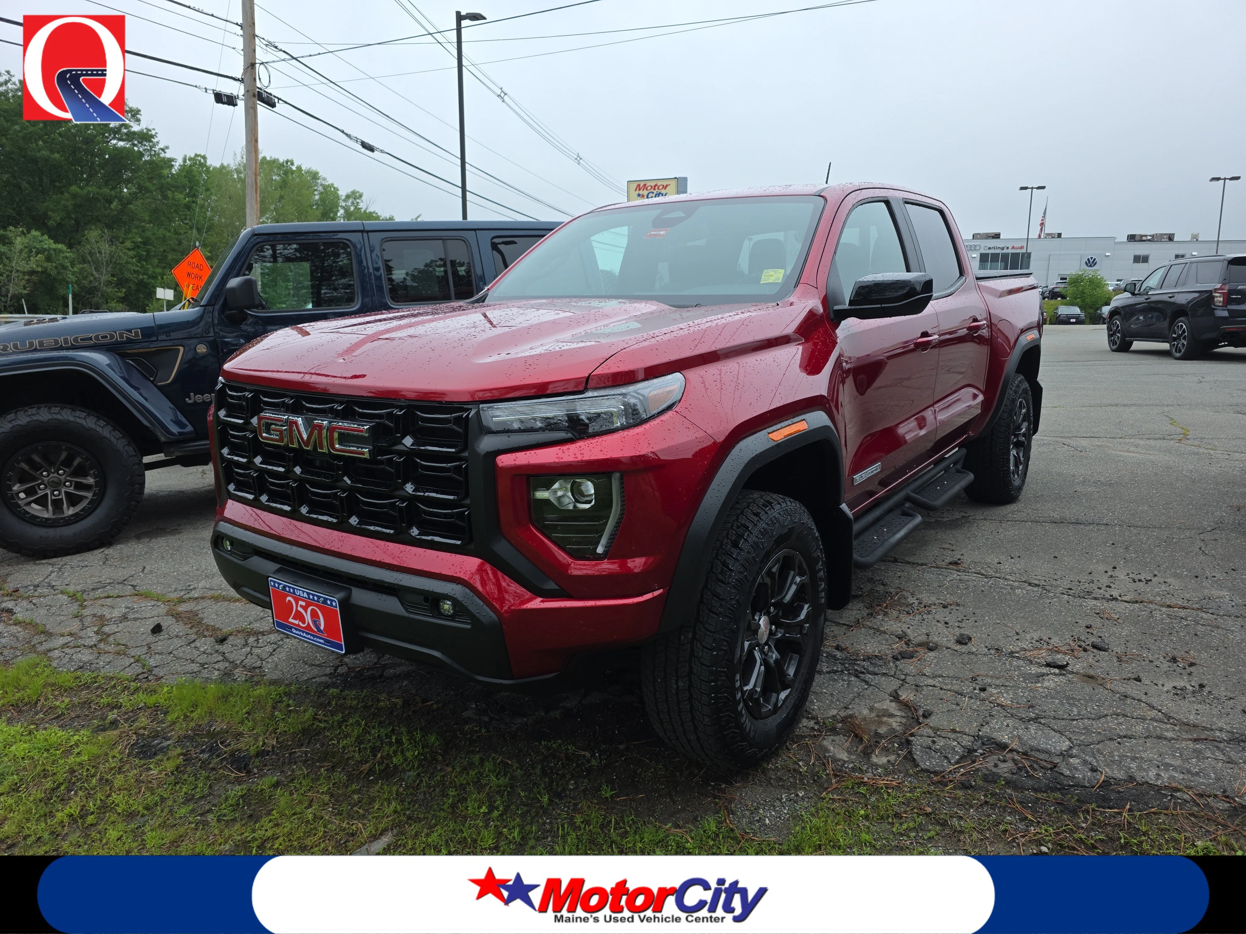 Used 2024 Volcanic Red Tintcoat GMC 4WD Elevation image 1