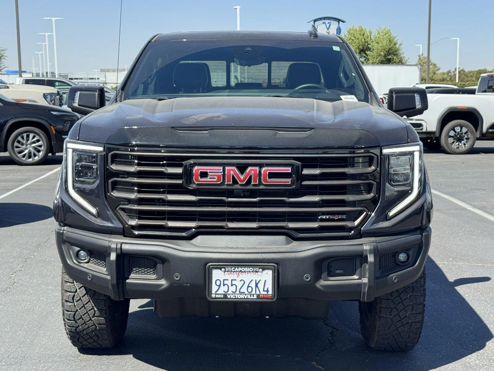 New 2026 TITANIUM RUSH METALLIC GMC AT4X image 2