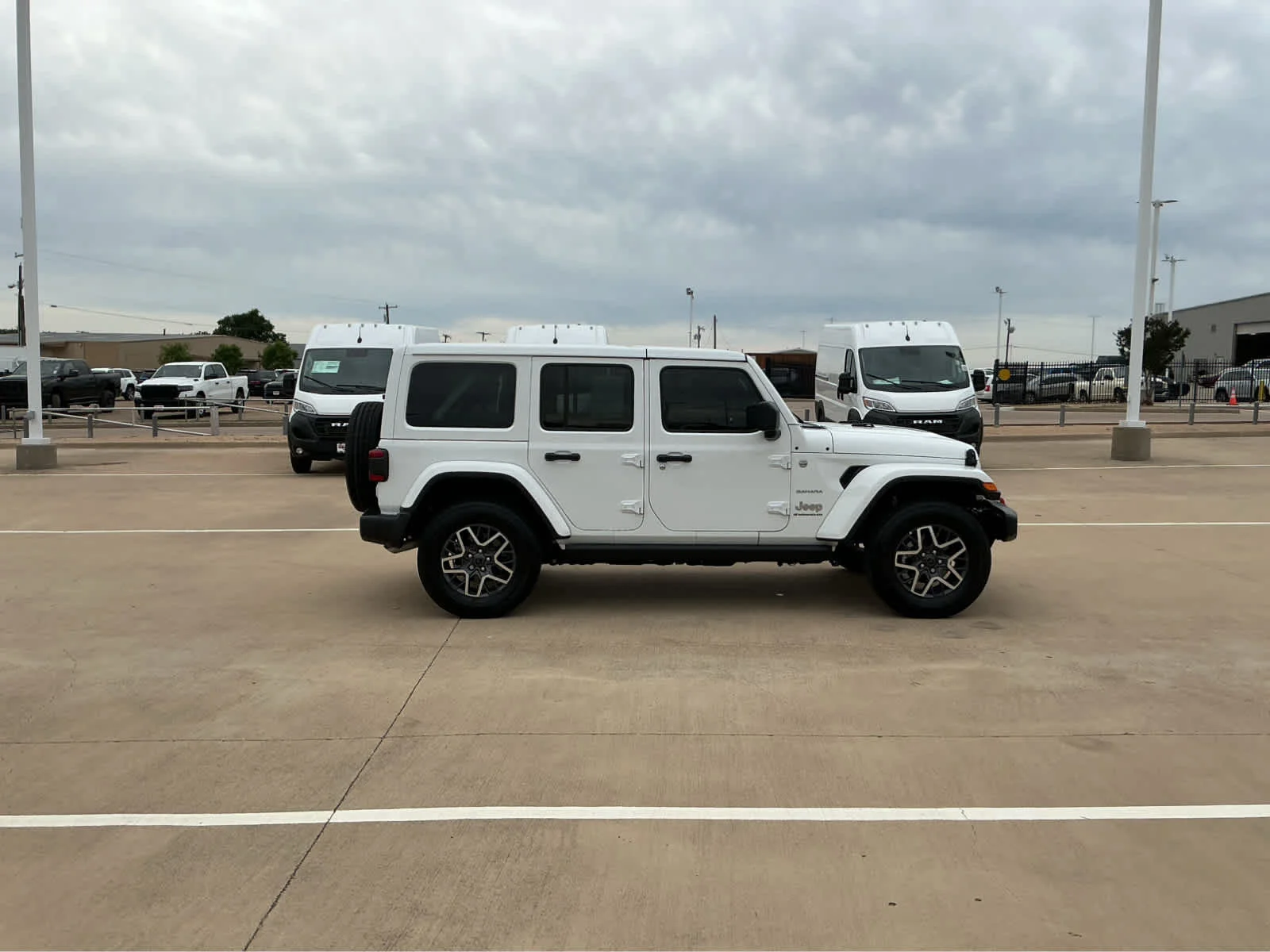 Used 2024 Bright White Clearcoat Jeep Sahara image 6