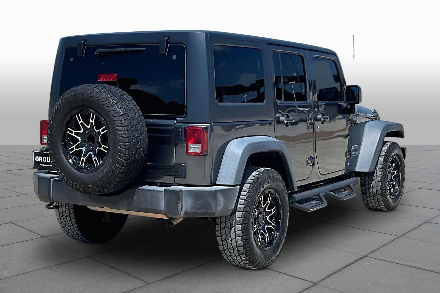 Used 2018 Granite Crystal Metallic Clearcoat Jeep Sport S image 11