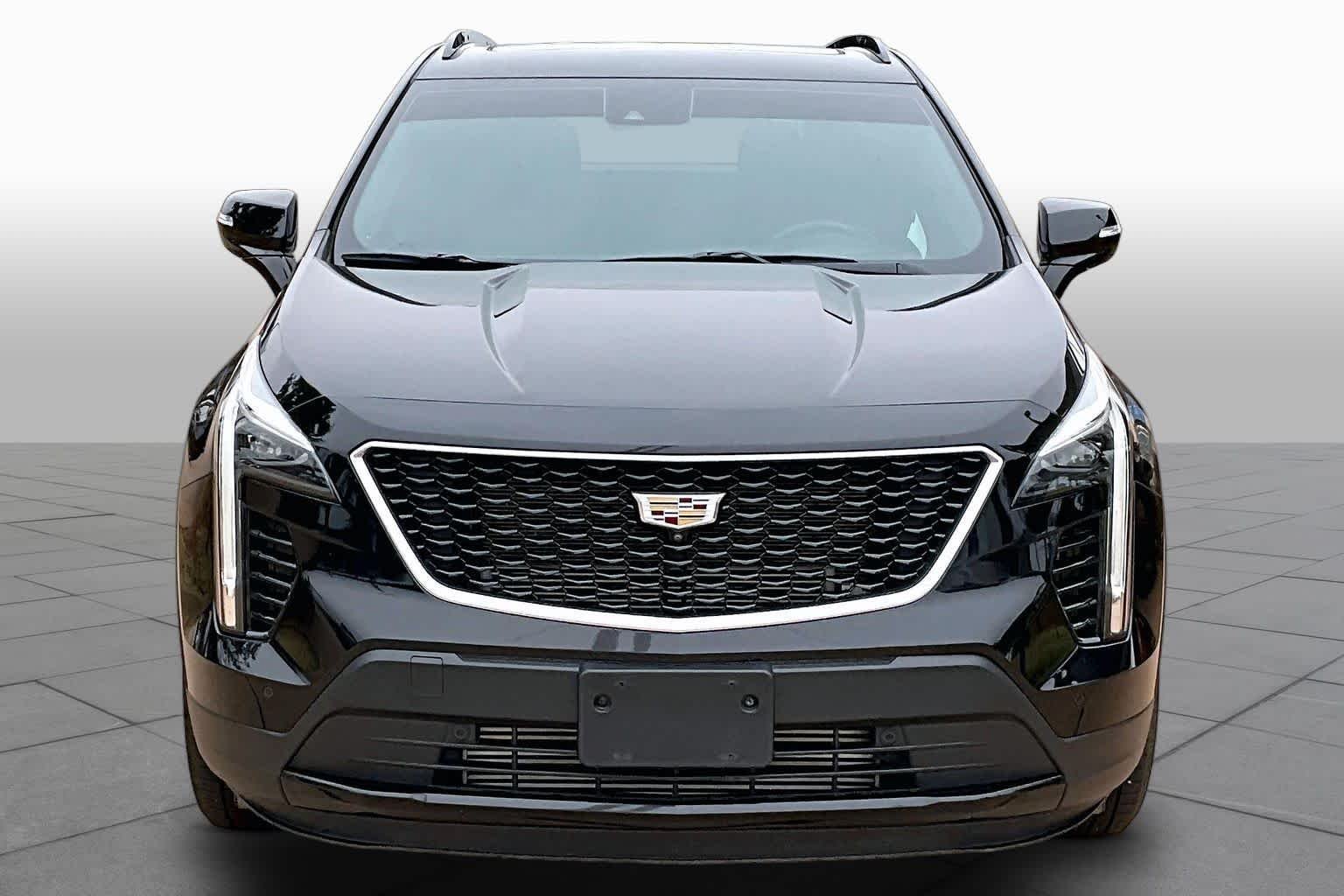 Used 2021 Stellar Black Metallic Cadillac FWD Sport image 4