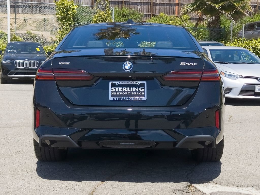 New 2026 Black Sapphire Metallic BMW 550e xDrive image 19