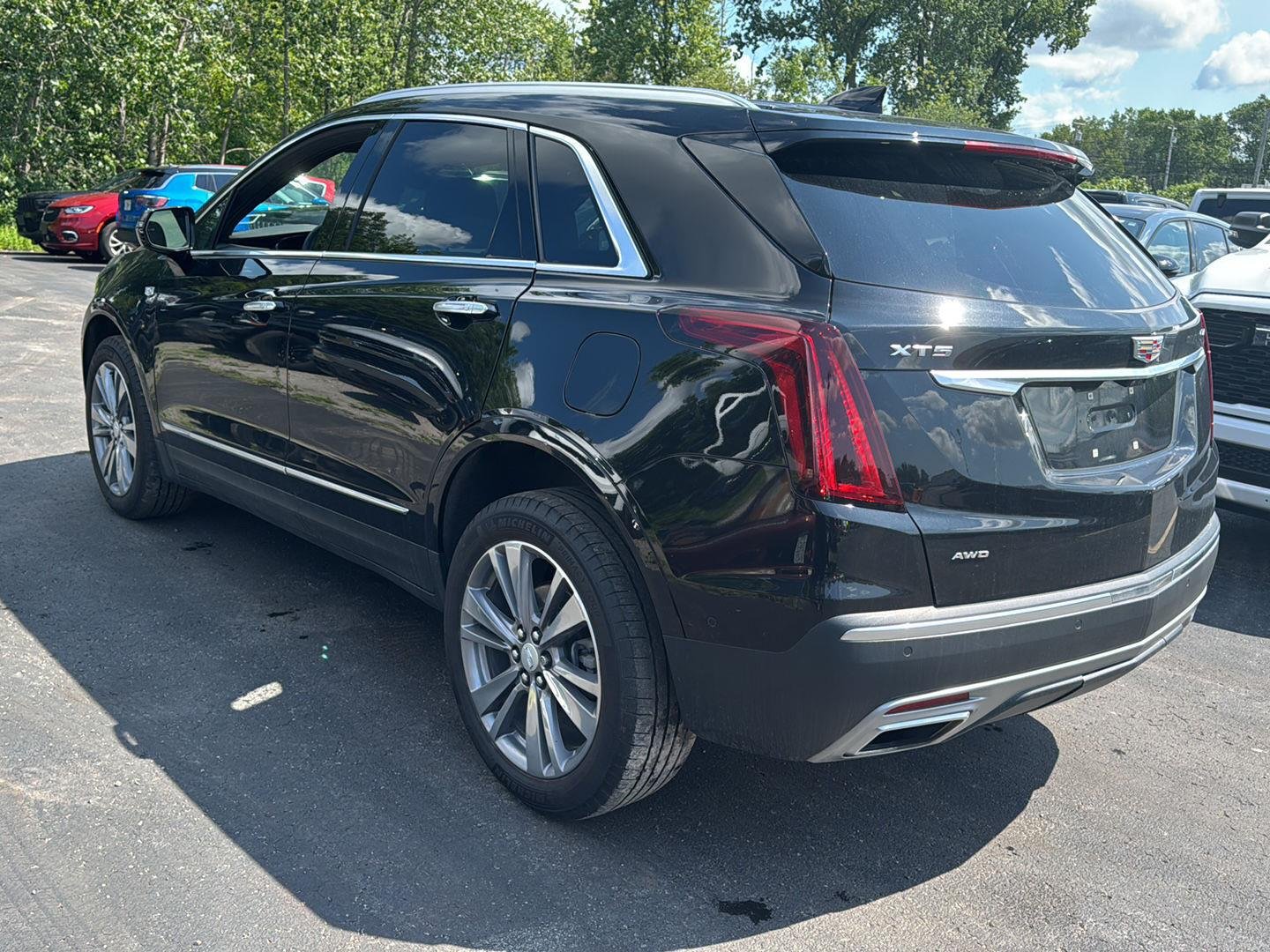Used 2025 Stellar Black Metallic Cadillac AWD Premium Luxury image 13