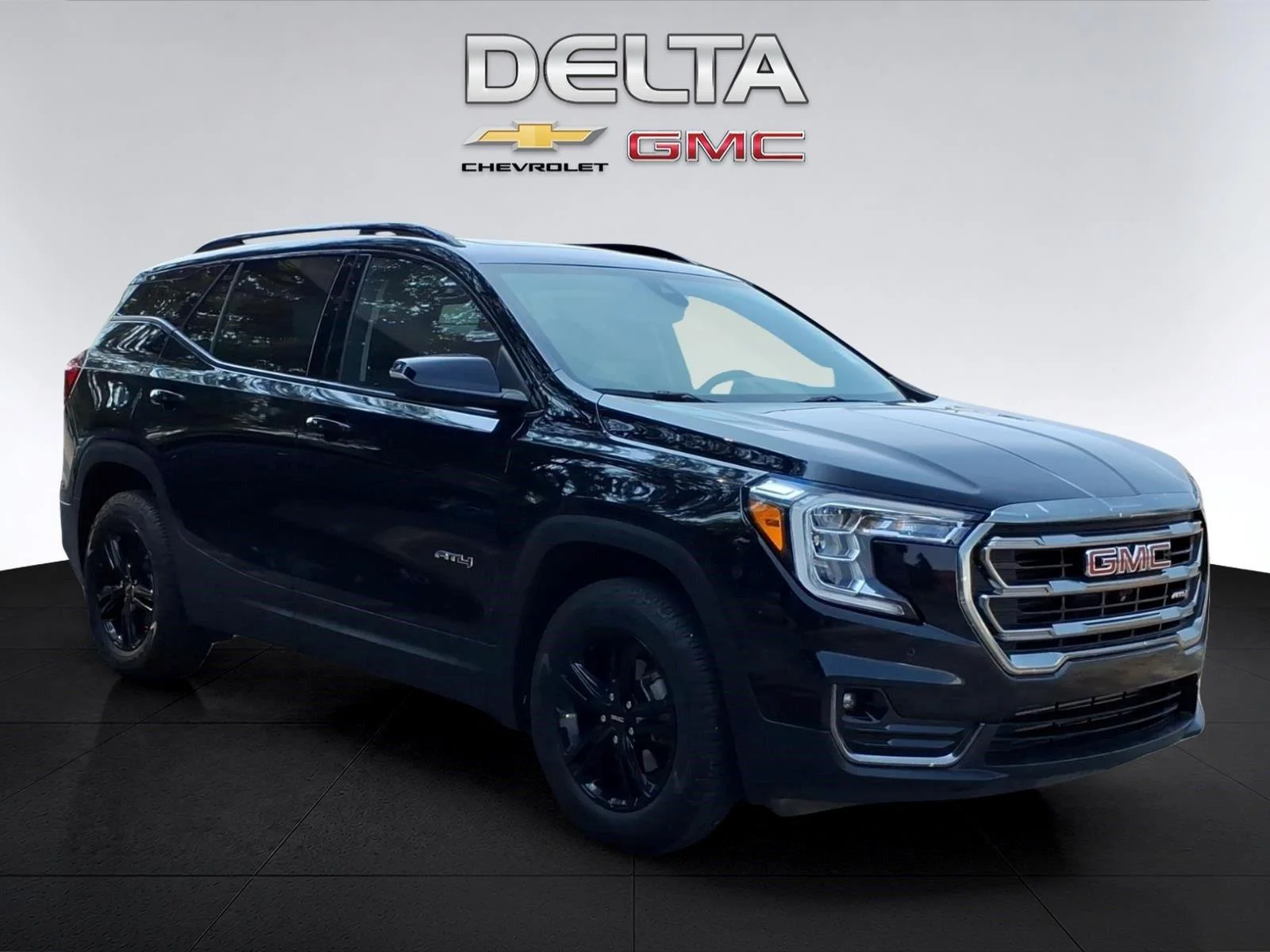 Used 2024 Ebony Twilight Metallic GMC AT4 image 7