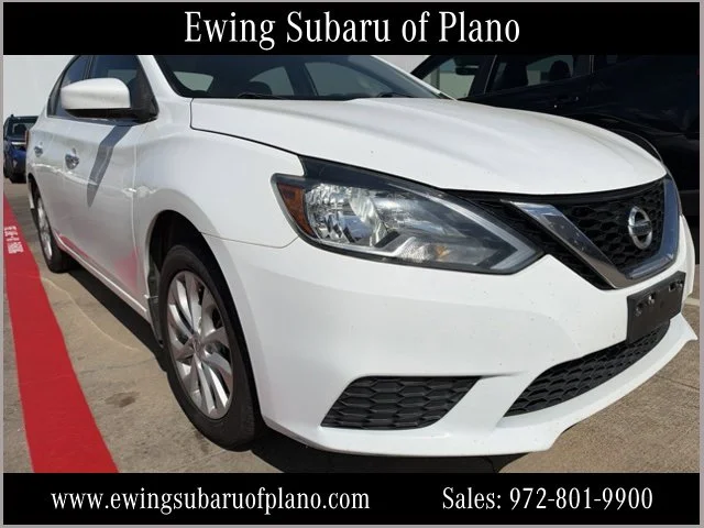 Used 2018 White Nissan SV image 1