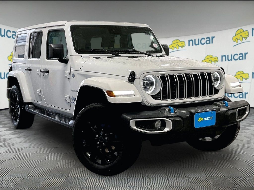 Used 2024 White Jeep Sahara 4xe image 1