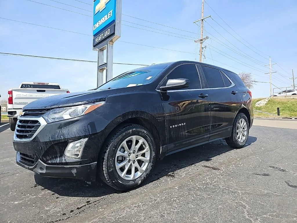 Used 2021 Chevrolet Equinox LT with VIN 2GNAXKEV7M6109477 for sale in Kansas City