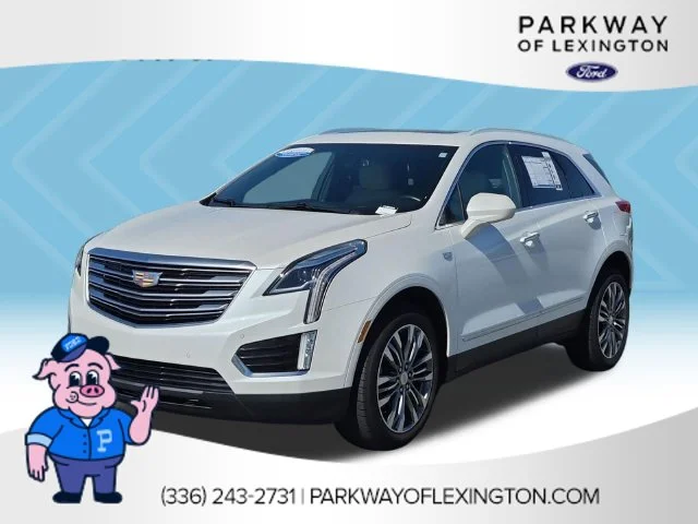 Used 2019 White Cadillac Premium Luxury image 1