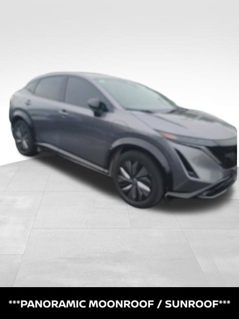 Certified Used 2024 Gray Nissan EVOLVE+ e-4ORCE image 6