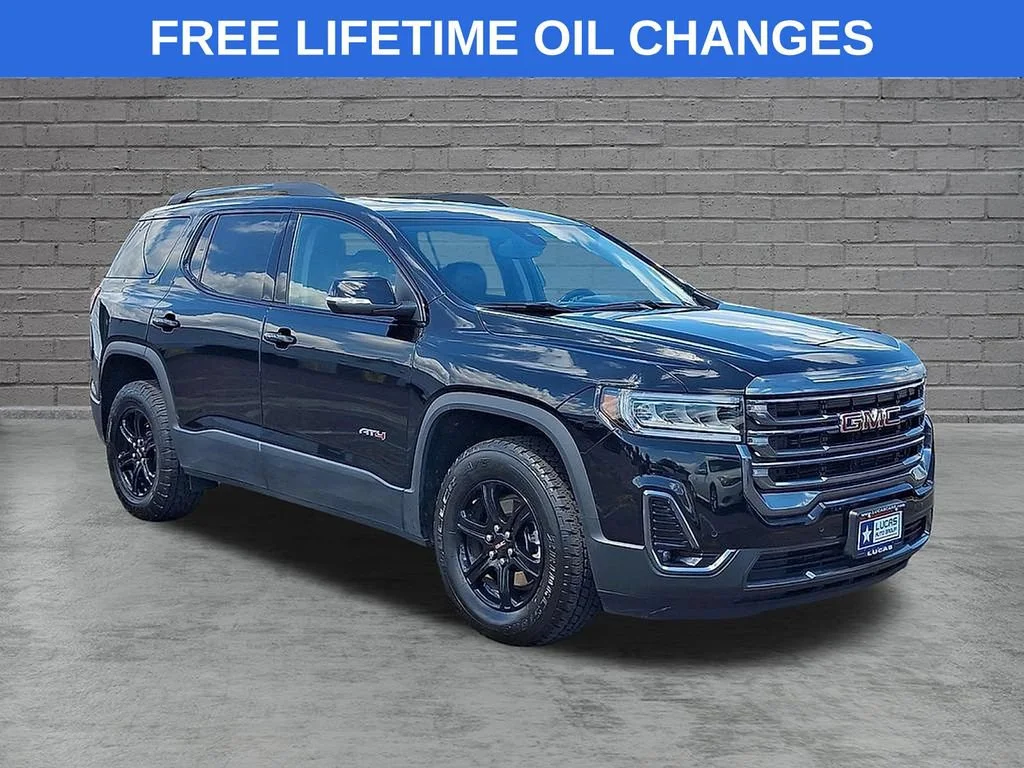 Used 2023 Ebony Twilight Metallic GMC AT4 image 1