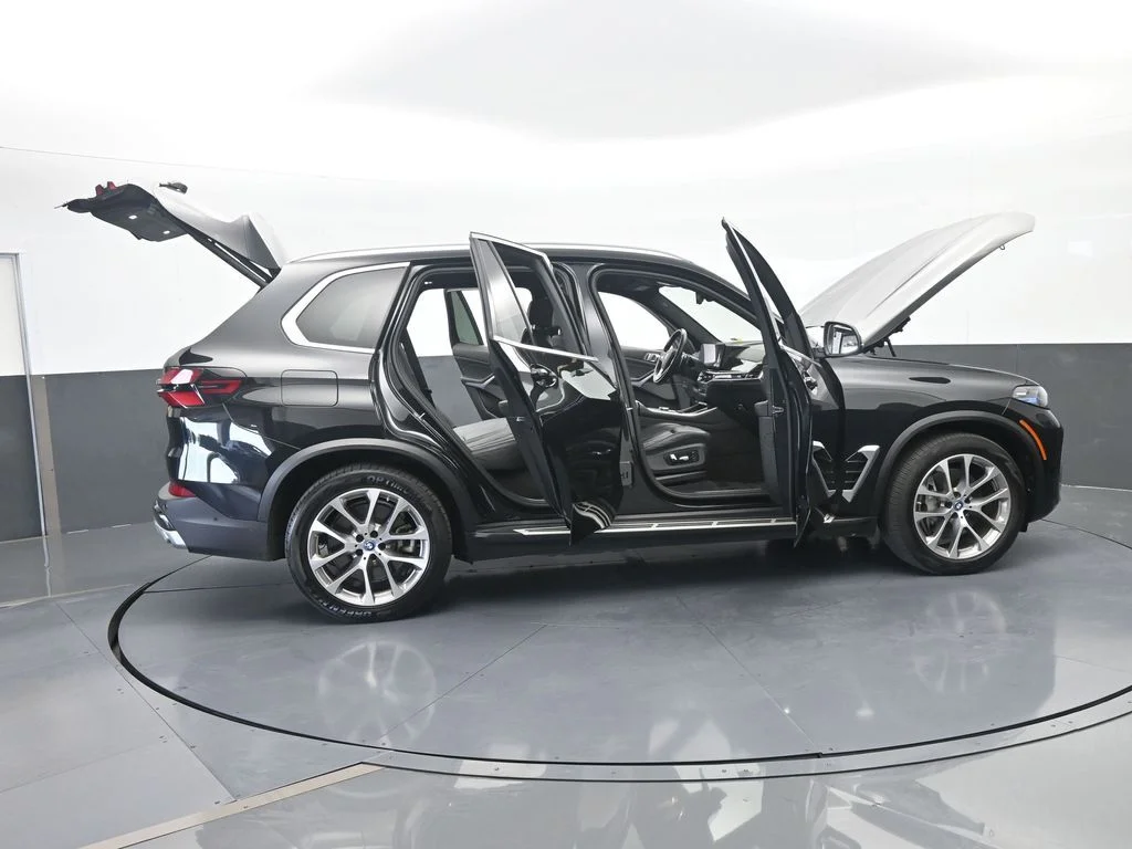 Used 2025 Black Sapphire Metallic BMW xDrive50e image 78