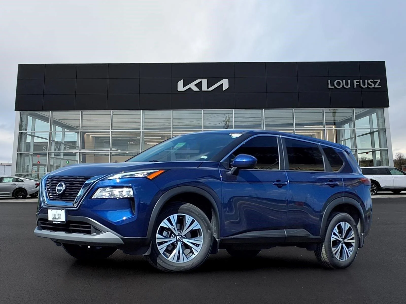 Used 2023 Caspian Blue Metallic Nissan SV image 1