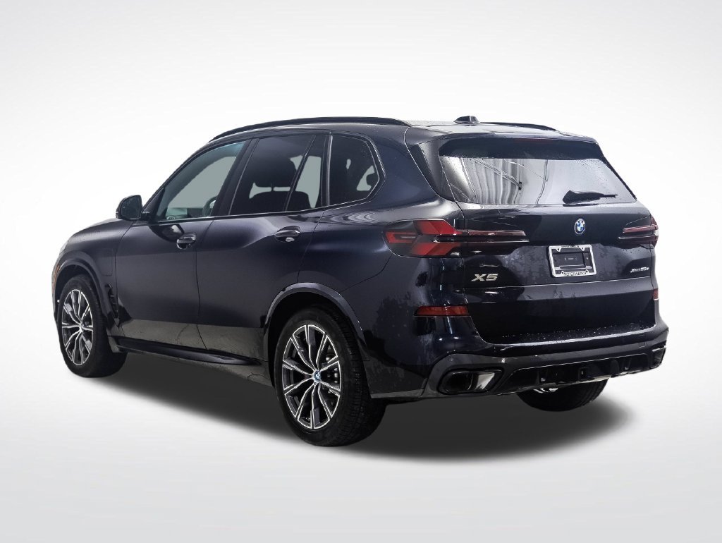 Certified Used 2025 Carbon Black Metallic BMW xDrive50e image 3