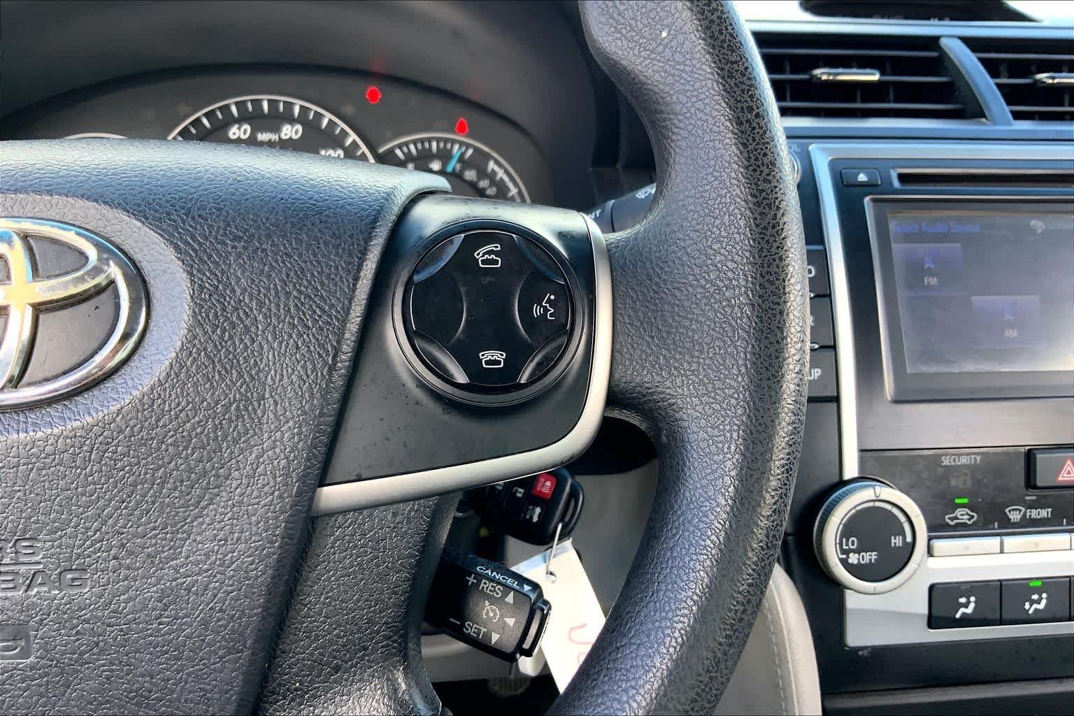 Used 2014 Magnetic Gray Metallic Toyota LE image 24