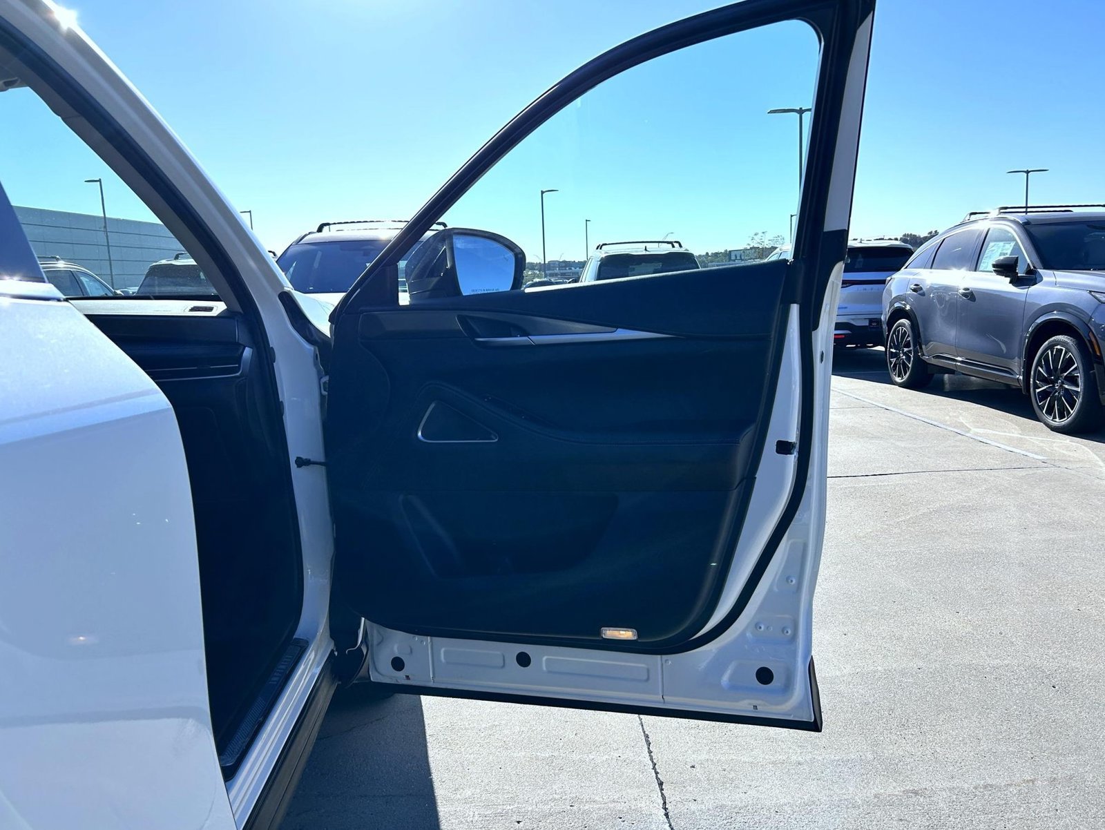 Certified Used 2025 White INFINITI LUXE image 16