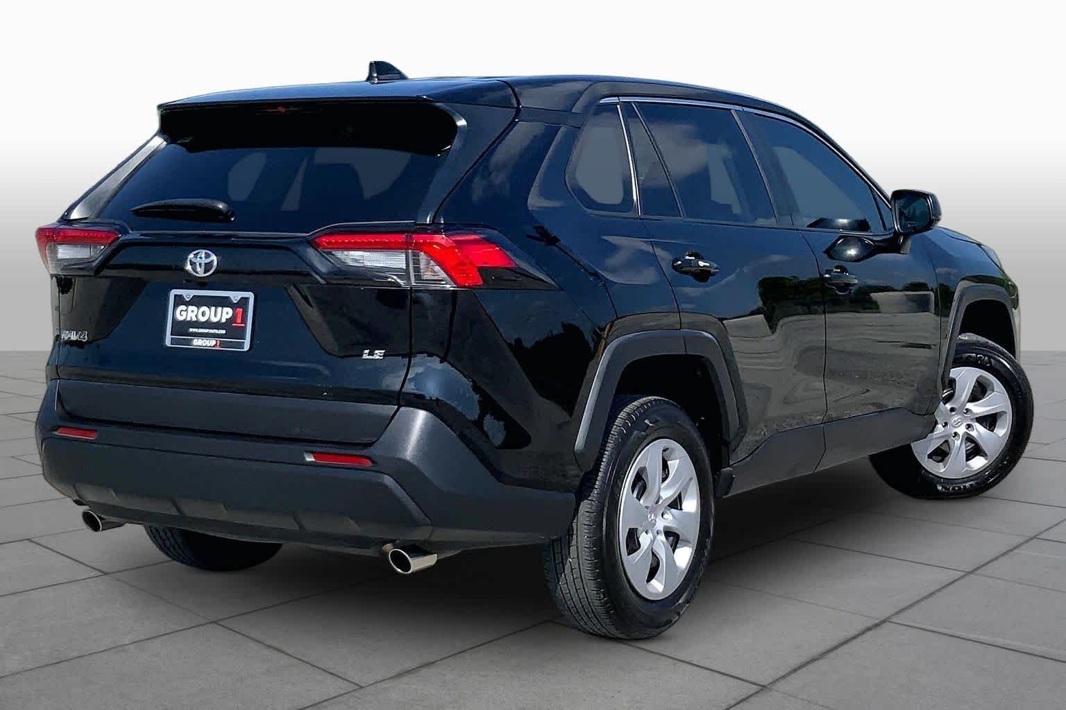 Used 2025 Midnight Black Metallic Toyota LE image 13