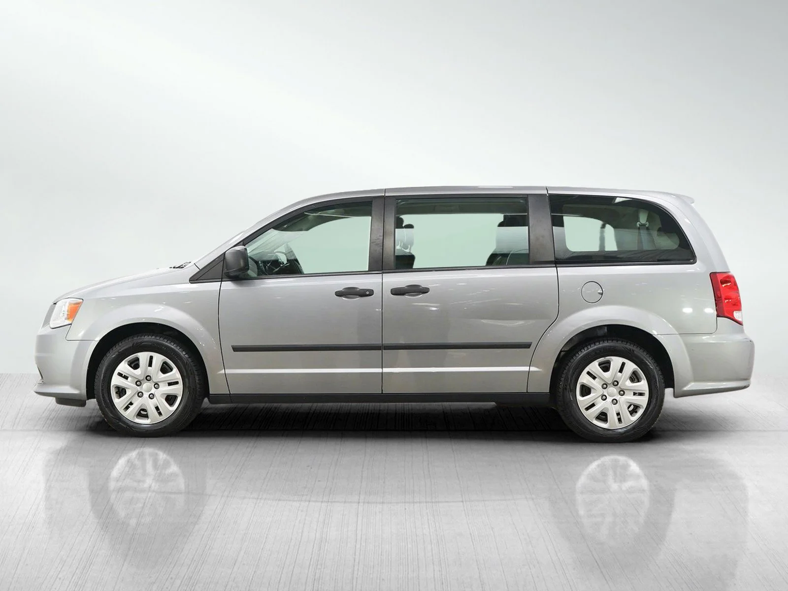 Used 2015 Dodge Grand Caravan American Value Package with VIN 2C4RDGBG4FR723993 for sale in Burnsville, Minnesota