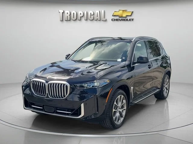 Used 2026 Black BMW sDrive40i image 1