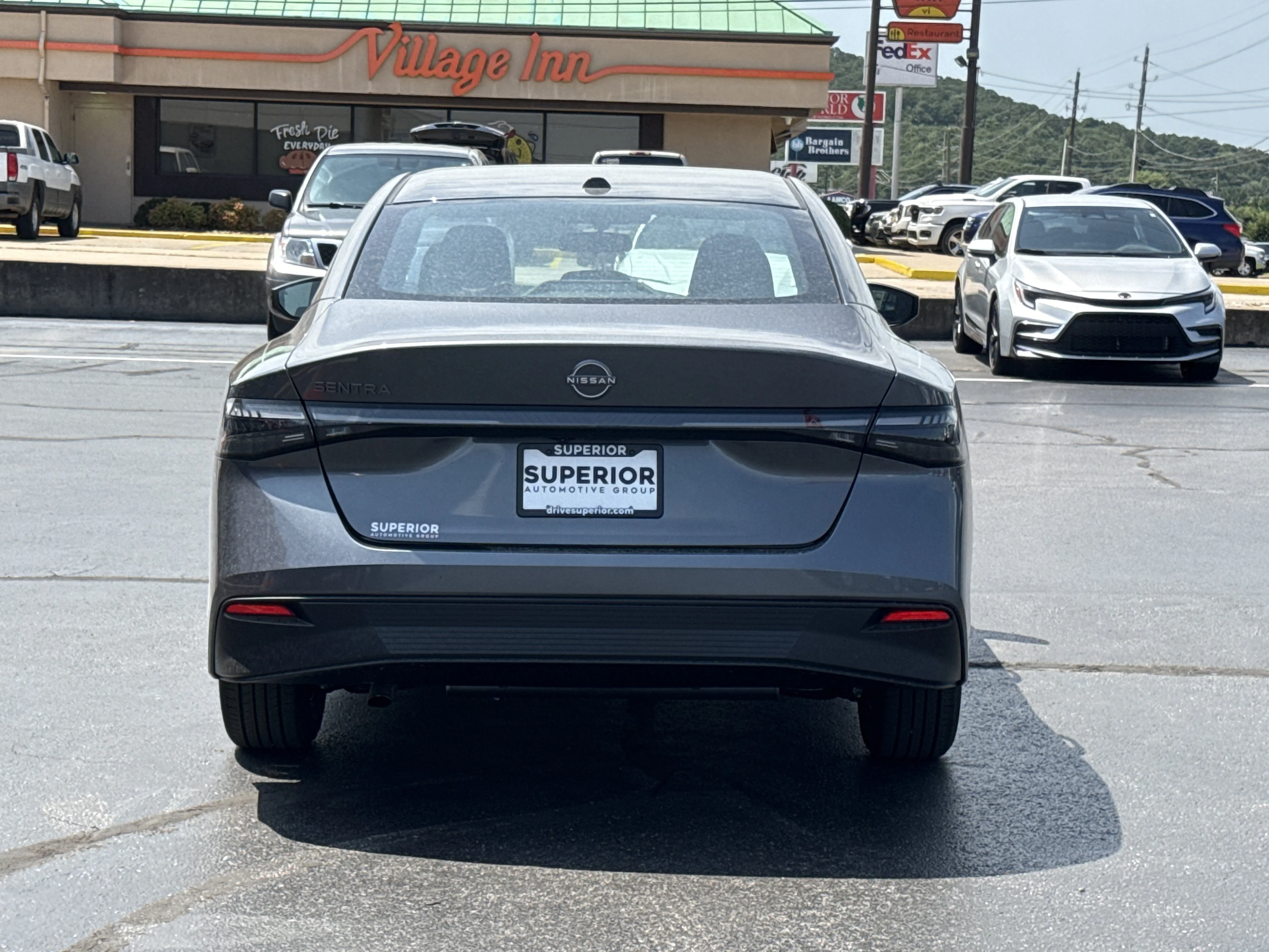New 2026 Gun Metallic Nissan SV image 4