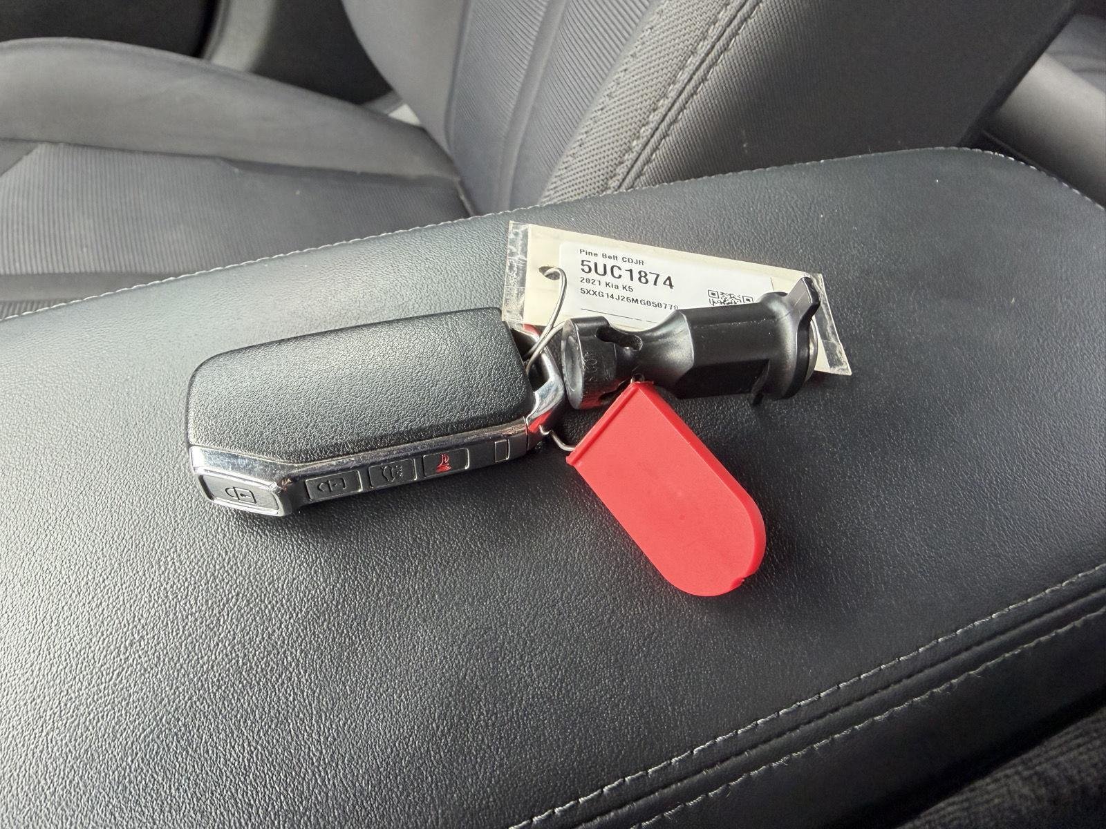 Used 2021 Passion Red Tintcoat Kia LXS image 12