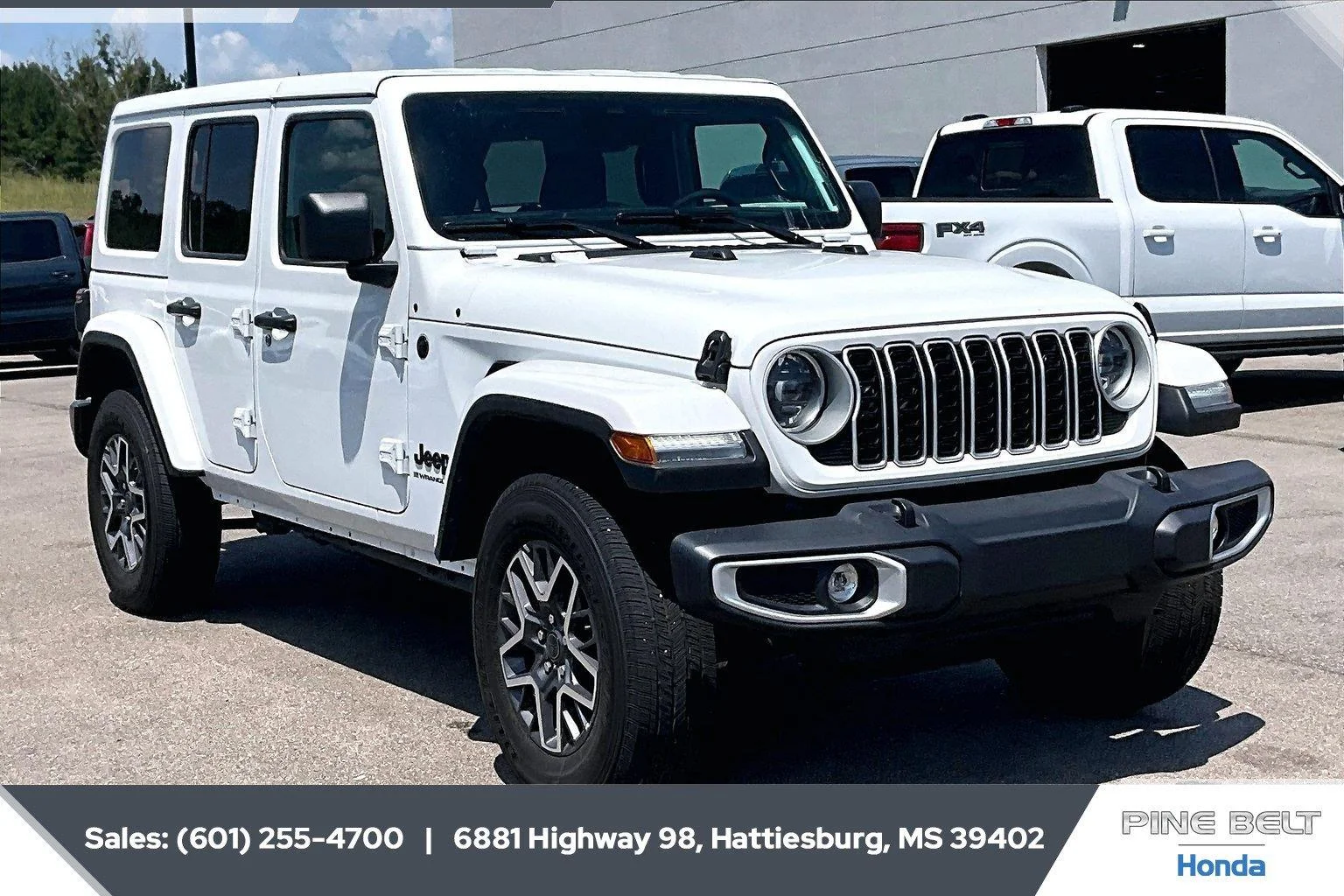 Used 2026 Bright White Clearcoat Jeep Sahara image 2