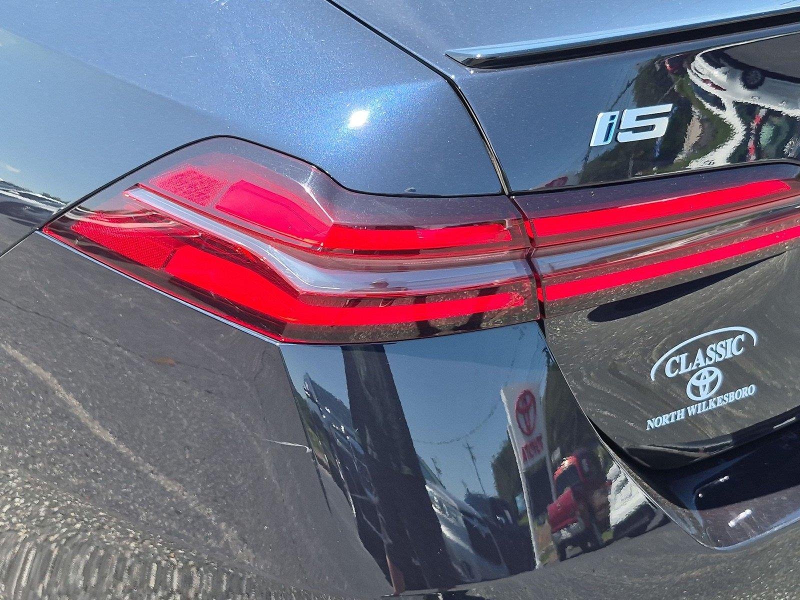 Used 2025 Carbon Black Metallic BMW xDrive40 image 12