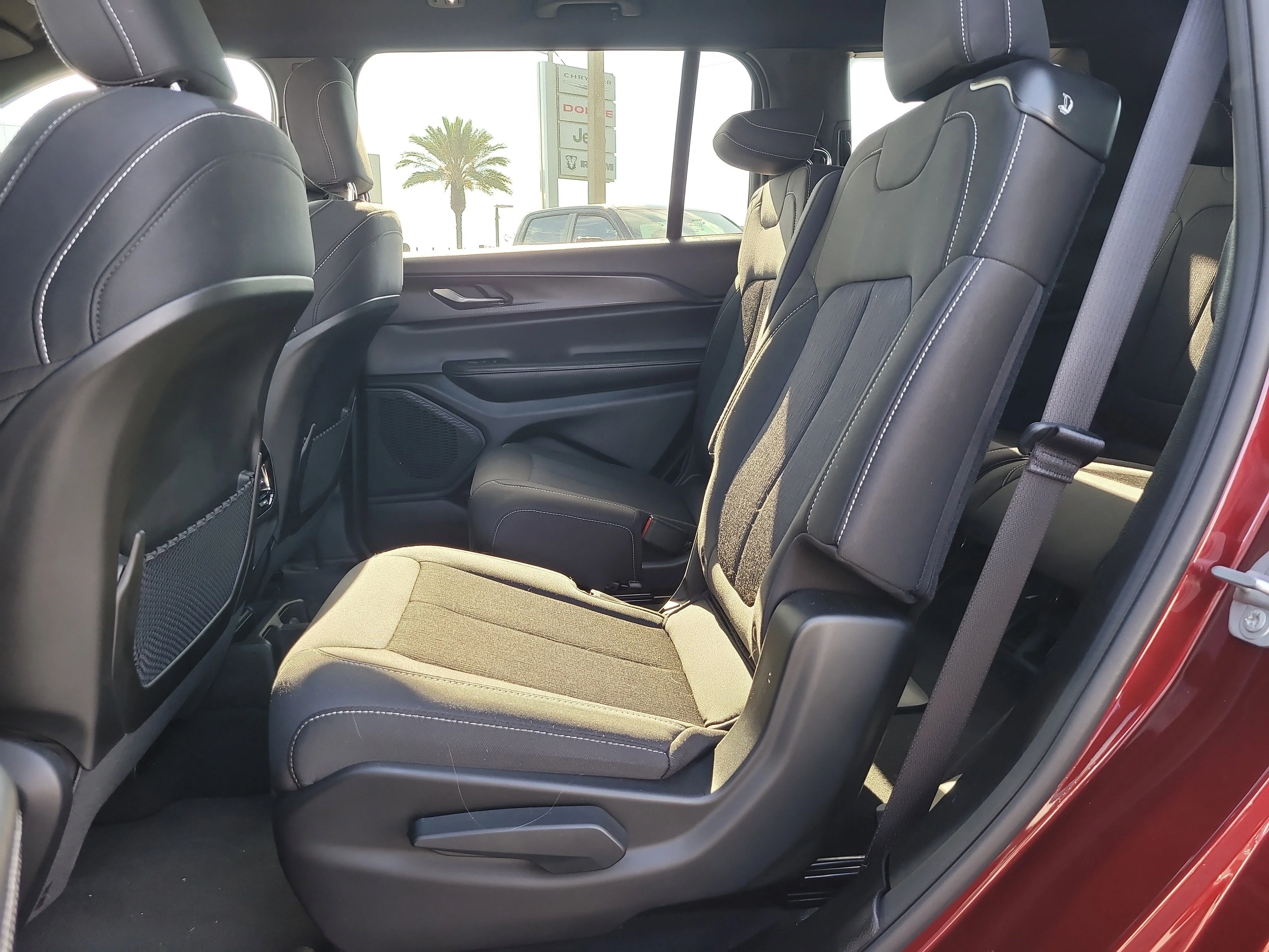 Used 2024 Velvet Red Pearlcoat Jeep Laredo image 11