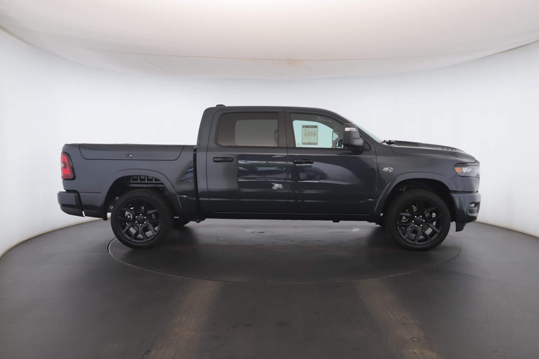 Used 2026 Forged Blue Metallic Ram Laramie 4x4 Crew Cab 5