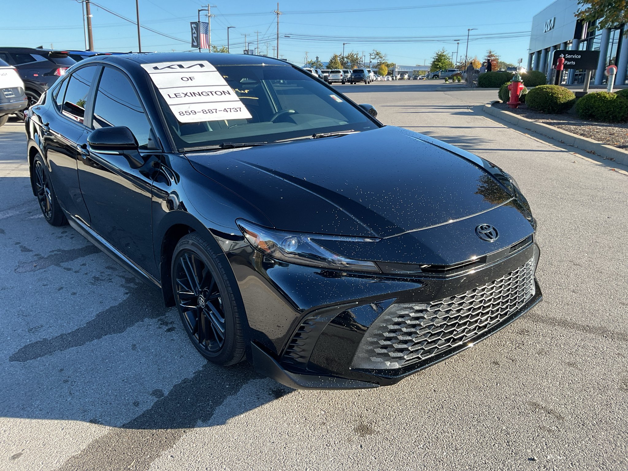 Used 2025 Midnight Black Metallic Toyota SE image 2