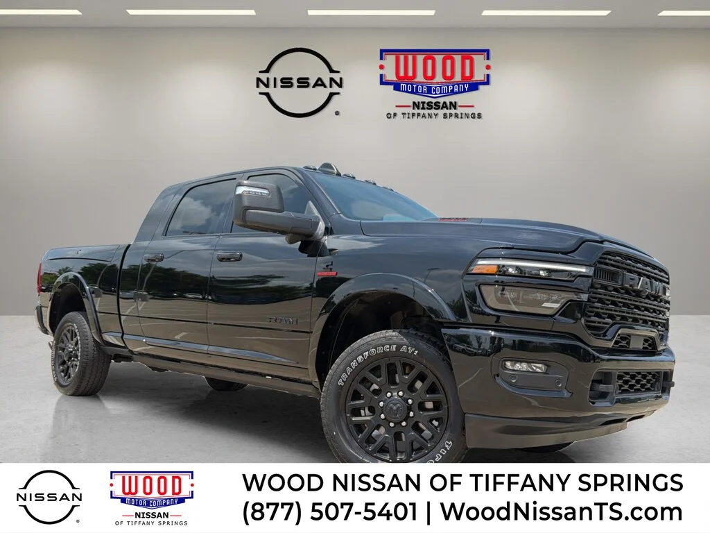 Used 2025 Diamond Black Crystal Pearlcoat Ram Limited image 1