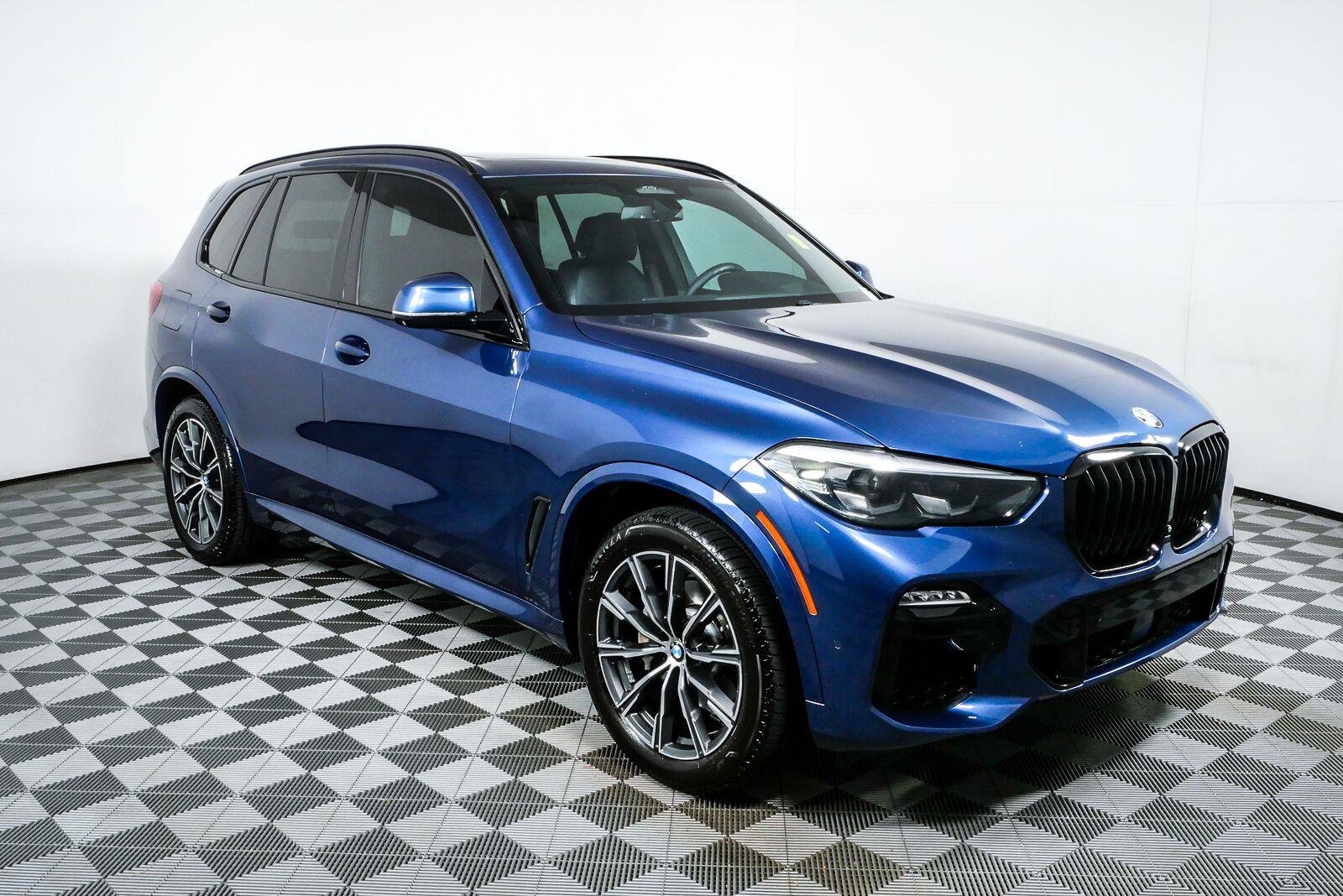 Used 2019 Tanzanite Blue II Metallic BMW xDrive40i image 1