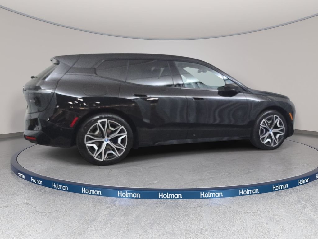 Used 2024 Black Sapphire Metallic BMW xDrive50 image 4