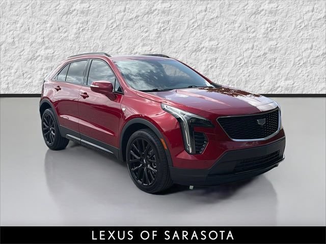 Used 2023 Radiant Red Tintcoat Cadillac FWD Sport image 1