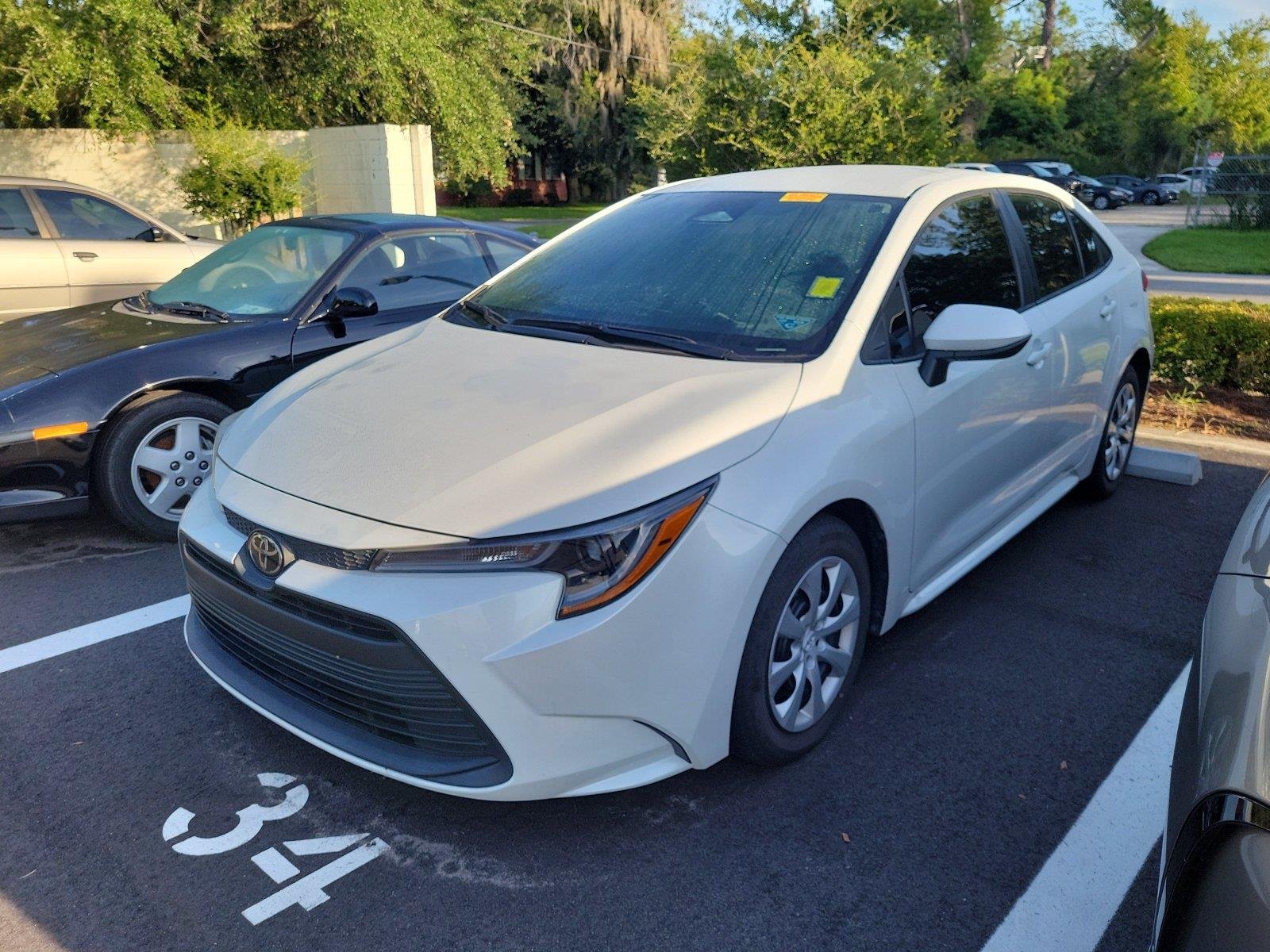 Used 2024 Wind Chill Pearl Toyota LE image 1