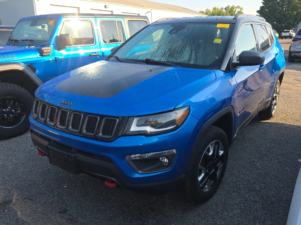 Used 2018 Laser Blue Pearl Coat Jeep Trailhawk image 1