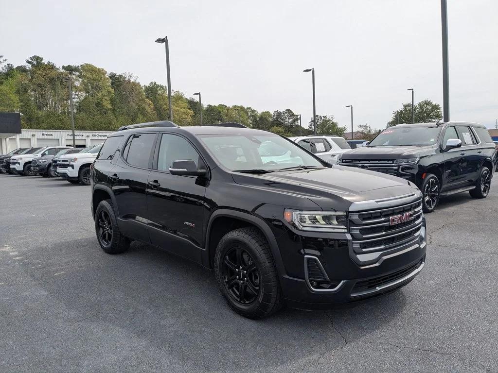 Used 2023 Ebony Twilight Metallic GMC AT4 image 3