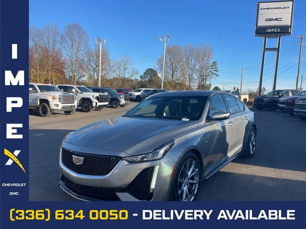 Used 2023 Argent Silver Metallic Cadillac Sport image 1