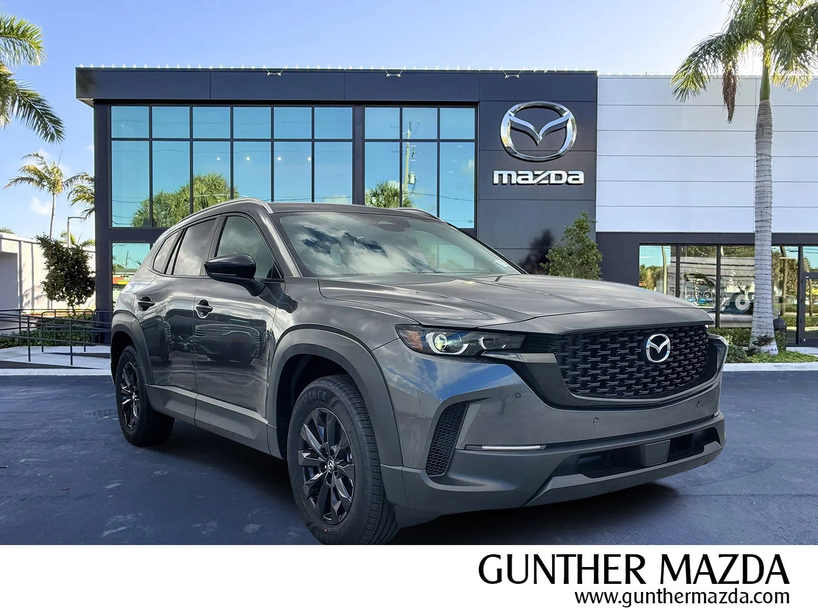 New 2026 Machine Gray Metallic Mazda Premium AWD image 1
