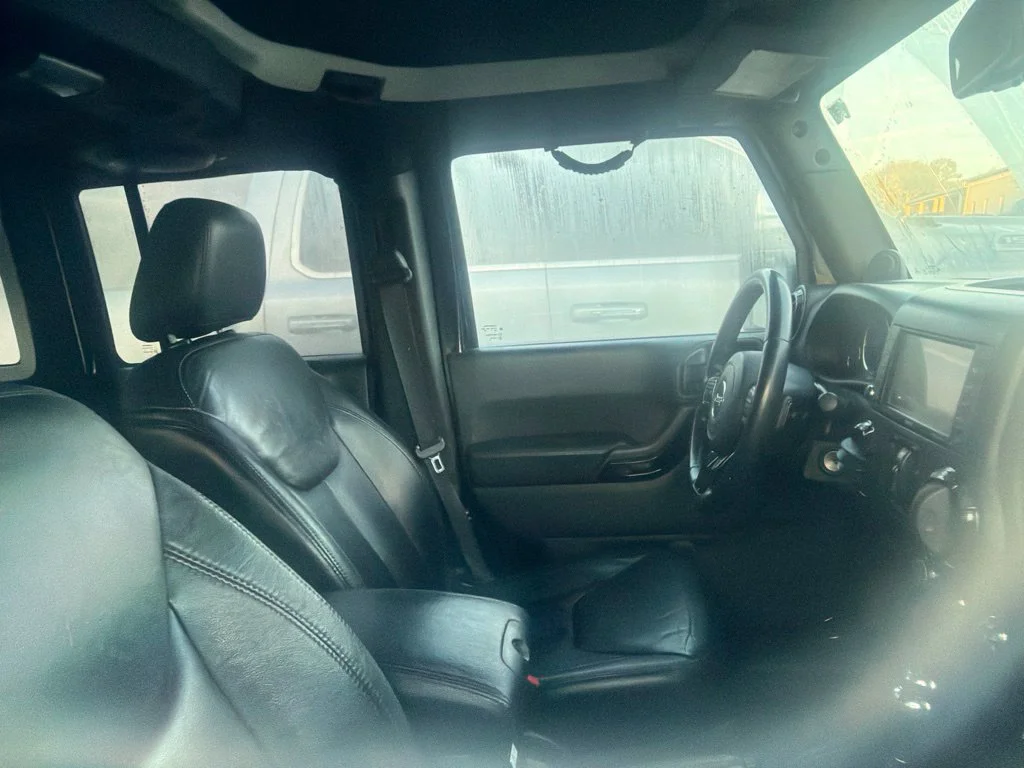 Used 2014 Black Clearcoat Jeep Unlimited Sahara image 2